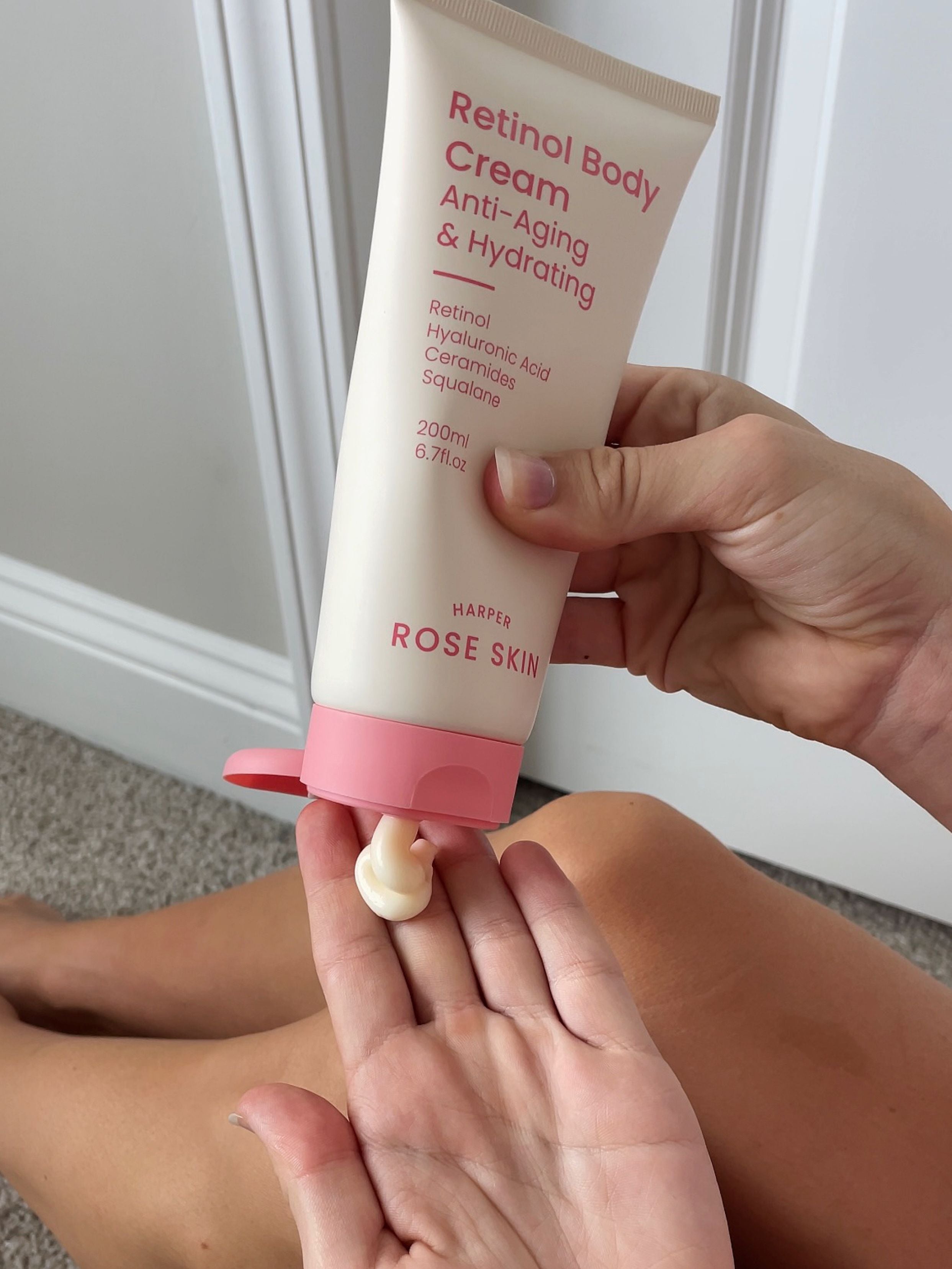 Applying Harper Rose Skin Body Cream